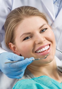 a patient receiving dental care from a dentist near Tyler